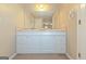 Bathroom with double sink vanity featuring ample cabinet space for storage and plenty of counter space at 175 Ashley Dr, Fayetteville, GA 30214