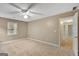 Comfortable bedroom featuring carpet, a ceiling fan, and a window at 175 Ashley Dr, Fayetteville, GA 30214
