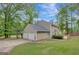 Charming two-story home with an attached garage, backyard, and deck at 175 Ashley Dr, Fayetteville, GA 30214
