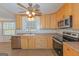 Kitchen with stainless appliances, a window over the sink, ceiling fan and an eat-in nook at 175 Ashley Dr, Fayetteville, GA 30214