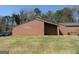 Exterior of brick Zone 6 Police Precinct building surrounded by green grass at 1876 Sw Sandtown Sw Rd, Atlanta, GA 30311