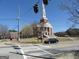 Classic brick church featuring a prominent white steeple, stately columns, and manicured lawn at 1876 Sw Sandtown Sw Rd, Atlanta, GA 30311