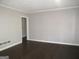 Spacious living room with gray walls and dark wood flooring at 1876 Sw Sandtown Sw Rd, Atlanta, GA 30311