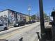 Street view featuring parked cars and a building with a mural of a face at 1876 Sw Sandtown Sw Rd, Atlanta, GA 30311