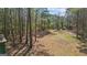 Picturesque view of wooded backyard of property at 850 Coan Dr, Locust Grove, GA 30248