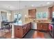 This kitchen features granite countertops, stainless steel appliances, and a breakfast bar at 7019 Diamond Dr, Rex, GA 30273