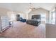 Spacious main bedroom features a vaulted ceiling, lots of light, carpet flooring, and neutral decor at 7019 Diamond Dr, Rex, GA 30273