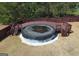 Backyard above-ground pool featuring a surrounding wooden deck, perfect for cooling off on a hot day at 7019 Diamond Dr, Rex, GA 30273