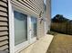 Exterior with French doors, wood siding and a small lawn at 345 Gaelic Way, Tyrone, GA 30290