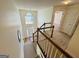 Spacious foyer and staircase bathed in natural light and great high ceilings at 345 Gaelic Way, Tyrone, GA 30290