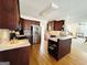 Modern kitchen with stainless steel appliances, sleek countertops, and ample storage, perfect for culinary enthusiasts at 345 Gaelic Way, Tyrone, GA 30290