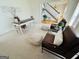 Office featuring a desk, armchairs, and soft neutral-colored carpet at 345 Gaelic Way, Tyrone, GA 30290