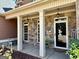 Charming front porch with stone accents and a welcoming entrance at 108 Caraway Rd, Locust Grove, GA 30248