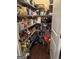 Walk-in pantry with abundant shelving for organized storage of food and supplies at 108 Caraway Rd, Locust Grove, GA 30248