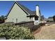 Beautiful exterior with nice backyard, lovely landscaping and mature trees at 108 Caraway Rd, Locust Grove, GA 30248