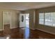 This living room features hardwood floors, natural light and neutral paint at 718 N Hairston Rd, Stone Mountain, GA 30083