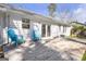 Outdoor deck with two blue Adirondack chairs, ideal for relaxing and entertaining at 4247 Windward Ln, Norcross, GA 30093