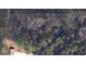 Aerial view of the property and surrounding lot at 105 Woodfield Rd, Covington, GA 30014