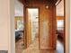 Open view of hallway that connects the bedrooms and bathroom at 105 Woodfield Rd, Covington, GA 30014