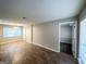 Spacious living room with hardwood floors, ample natural light, and a view into adjacent rooms at 3395 Longleaf Dr, Decatur, GA 30032