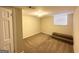 Basement space featuring carpet, neutral walls, and a small window at 3558 Turner Heights Dr, Decatur, GA 30032