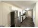 Modern kitchen featuring stainless steel appliances, white cabinets, and granite countertops at 3558 Turner Heights Dr, Decatur, GA 30032