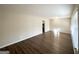 Spacious living room featuring wood floors, natural light, and neutral walls at 3558 Turner Heights Dr, Decatur, GA 30032