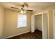 Cozy bedroom with ceiling fan, closet and window offering ample natural light at 4517 Golf Vista Cir, Decatur, GA 30035