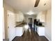 Kitchen with stainless steel appliances, granite countertops, and updated wood-look flooring at 4517 Golf Vista Cir, Decatur, GA 30035