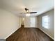 Inviting living room with laminate flooring and ceiling fan, showcasing the freshly painted interior at 2191 Tilson Cir, Decatur, GA 30032