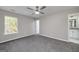 Bedroom with a window and carpeted floors, offering a comfortable space for relaxation at 253 Summit View Dr, Mcdonough, GA 30253