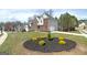 Two-story home with brick and siding, attached garage, and a well-maintained front lawn at 253 Summit View Dr, Mcdonough, GA 30253