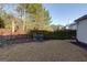 Relaxing backyard space featuring a bench, bordered garden, and a peaceful, green setting at 4030 Cresent Walk Ne Ln, Suwanee, GA 30024