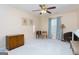 Bonus room with neutral walls, carpet, a ceiling fan, and natural light from a window at 4030 Cresent Walk Ne Ln, Suwanee, GA 30024