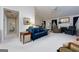 Open-concept living room with vaulted ceilings and plenty of space for entertaining guests at 4030 Cresent Walk Ne Ln, Suwanee, GA 30024