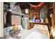 Image shows basement laundry with a washing machine and dryer with a water heater and furnace at 9100 Settlers Grove Ne Rd, Covington, GA 30014