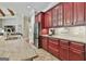 Kitchen featuring granite countertops, stainless steel appliances, and custom cabinets, with recessed lighting at 310 Westbourne Dr, Tyrone, GA 30290