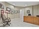 Spacious office with hardwood floors, built in desk, and ample lighting at 310 Westbourne Dr, Tyrone, GA 30290