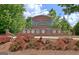 Welcome sign with brick facade and lush landscaping at 310 Westbourne Dr, Tyrone, GA 30290