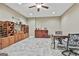 Cozy basement wine room with stylish wine racks and a table for wine tasting at 310 Westbourne Dr, Tyrone, GA 30290