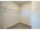 Empty closet with carpeted floor and wire shelving. Plenty of room for clothes and storage at 10453 Trellis Lane (Lot 28), Hampton, GA 30228