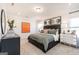 Calm main bedroom showcasing neutral decor, soft carpeting, and stylish furnishings at 10453 Trellis Lane (Lot 28), Hampton, GA 30228