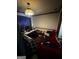 Cozy bedroom featuring a workspace, providing a comfortable and functional space for work or relaxation at 120 Wayside Dr, Lawrenceville, GA 30046