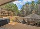 Well-maintained back deck with views of the lush backyard at 180 Collins Way, Locust Grove, GA 30248