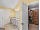 Large bathroom with dual sinks and a walk-in closet, offering ample storage at 180 Collins Way, Locust Grove, GA 30248