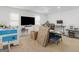 Spacious bonus room features plush carpet and ample natural light at 180 Collins Way, Locust Grove, GA 30248