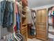 Organized walk-in closet with custom shelving, drawers, and ample storage space at 180 Collins Way, Locust Grove, GA 30248