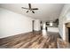 Bright living room with hardwood flooring, a fireplace, and an open layout at 220 Long Dr, Mcdonough, GA 30253