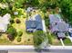 Aerial view of the property showcasing its landscaped yard and position on the street at 35 W Main St, Hampton, GA 30228