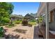 Spacious backyard featuring a statue and well-manicured landscaping perfect for outdoor gatherings at 35 W Main St, Hampton, GA 30228